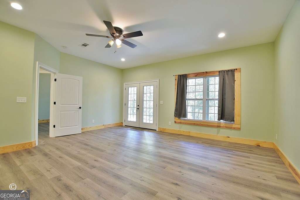 3175 Salem Road Pine Mountain, GA 31822 - Photo 36 of 41 a view of an empty room with window and wooden floor