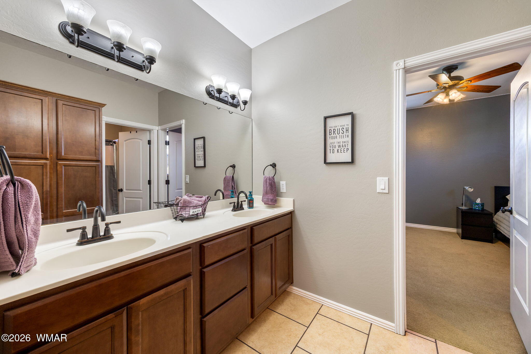 1940 Stonegate Way Heber, AZ 85928 - Photo 31 of 62 a bathroom with a sink double vanity and a mirror