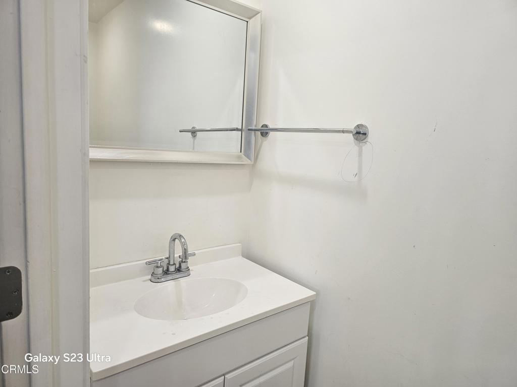 14550 Burbank Boulevard, Unit 103 Sherman Oaks, CA 91411 - Photo 14 of 27 a bathroom with a sink and mirror