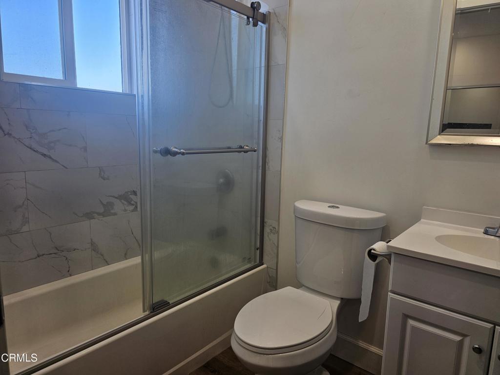 14550 Burbank Boulevard, Unit 103 Sherman Oaks, CA 91411 - Photo 18 of 27 a white toilet sitting next to a bath tub