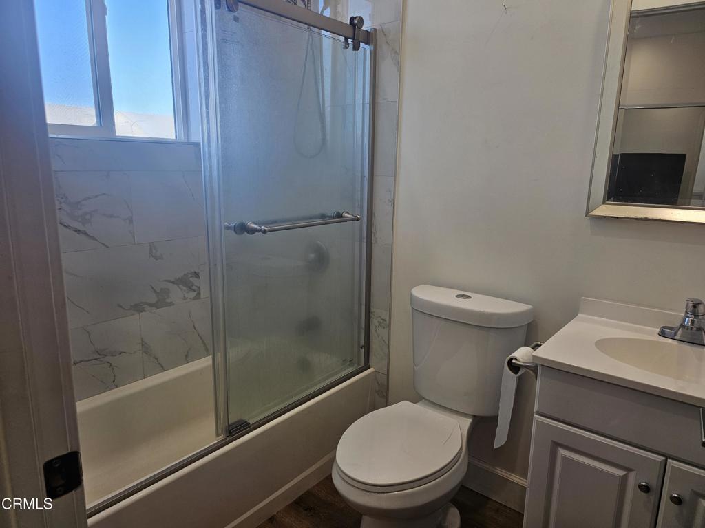 14550 Burbank Boulevard, Unit 103 Sherman Oaks, CA 91411 - Photo 23 of 27 a white toilet sitting next to a bath tub