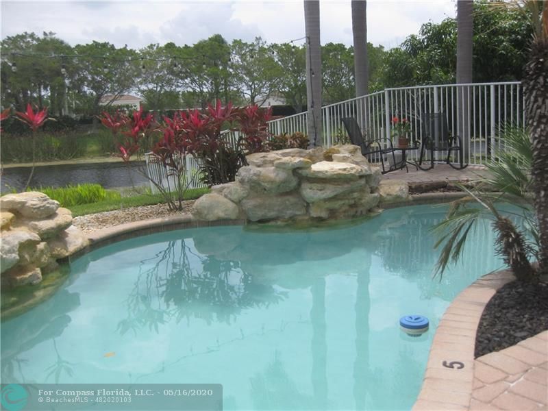 Nautica Isles Greenacres, FL 33463 - Photo 15 of 35 POOL WITH FOUNTAIN FEATURES