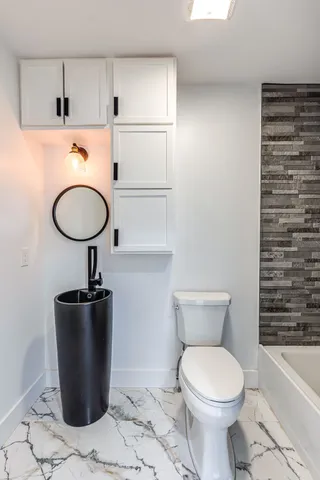 a bathroom with a bathtub