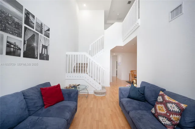 a living room with furniture and a couch