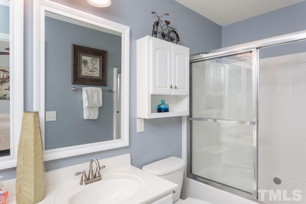 5431 Golden Arrow Lane Raleigh, NC 27613 - Photo 3 of 10 This is one of the two full baths. This one has dual vanity, a large tub/shower and plenty of space for preparing for the day.