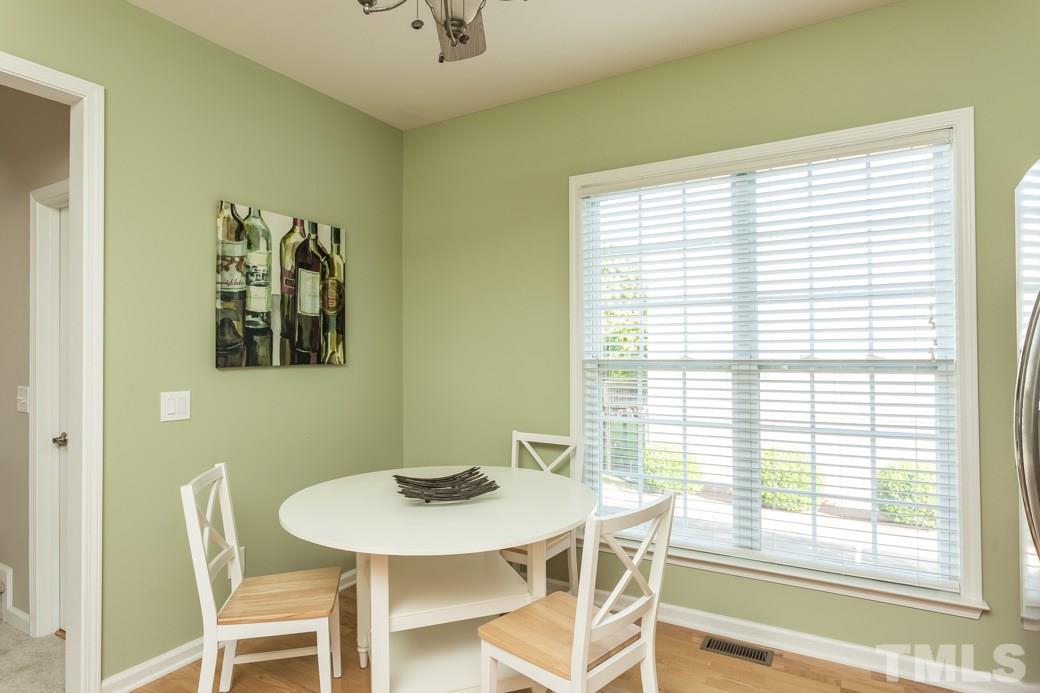 5431 Golden Arrow Lane Raleigh, NC 27613 - Photo 5 of 10 The breakfast area in the kitchen is large enough for the entire family to sit down together and enjoy a nice meal.