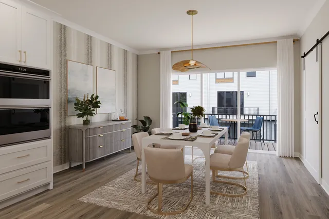 a very nice looking dining room with a table and chairs