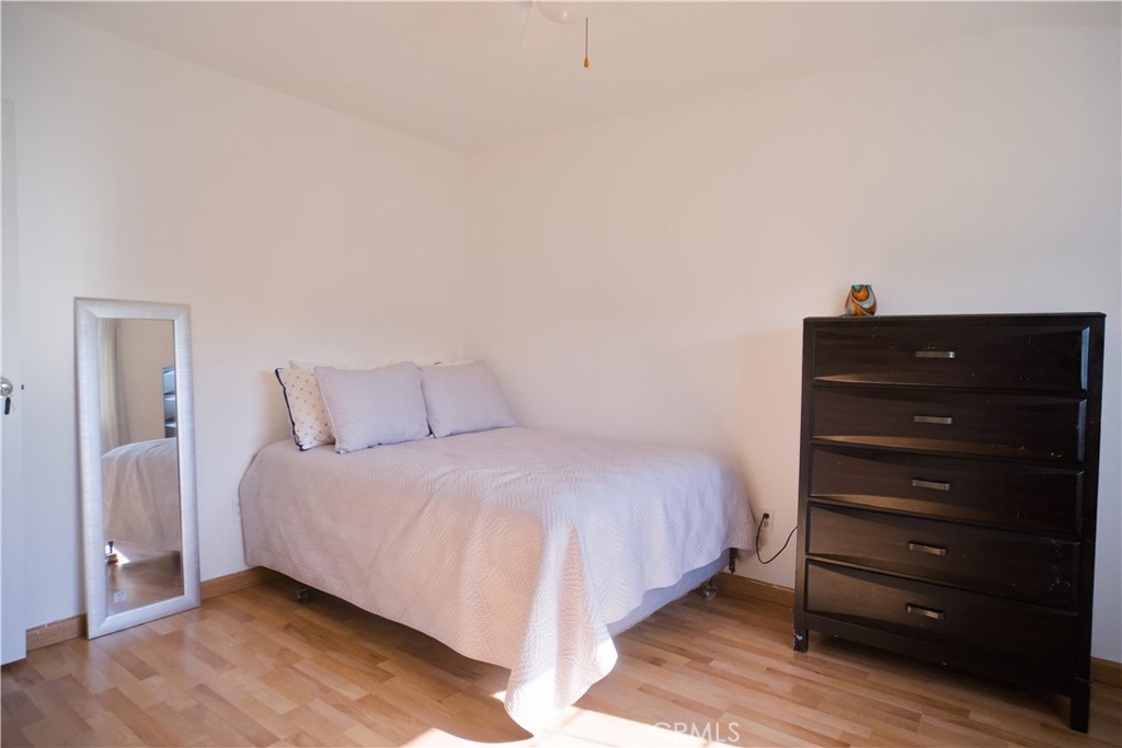 1312 Durham Street Simi Valley, CA 93065 - Photo 4 of 10 a bedroom with a bed and a dresser