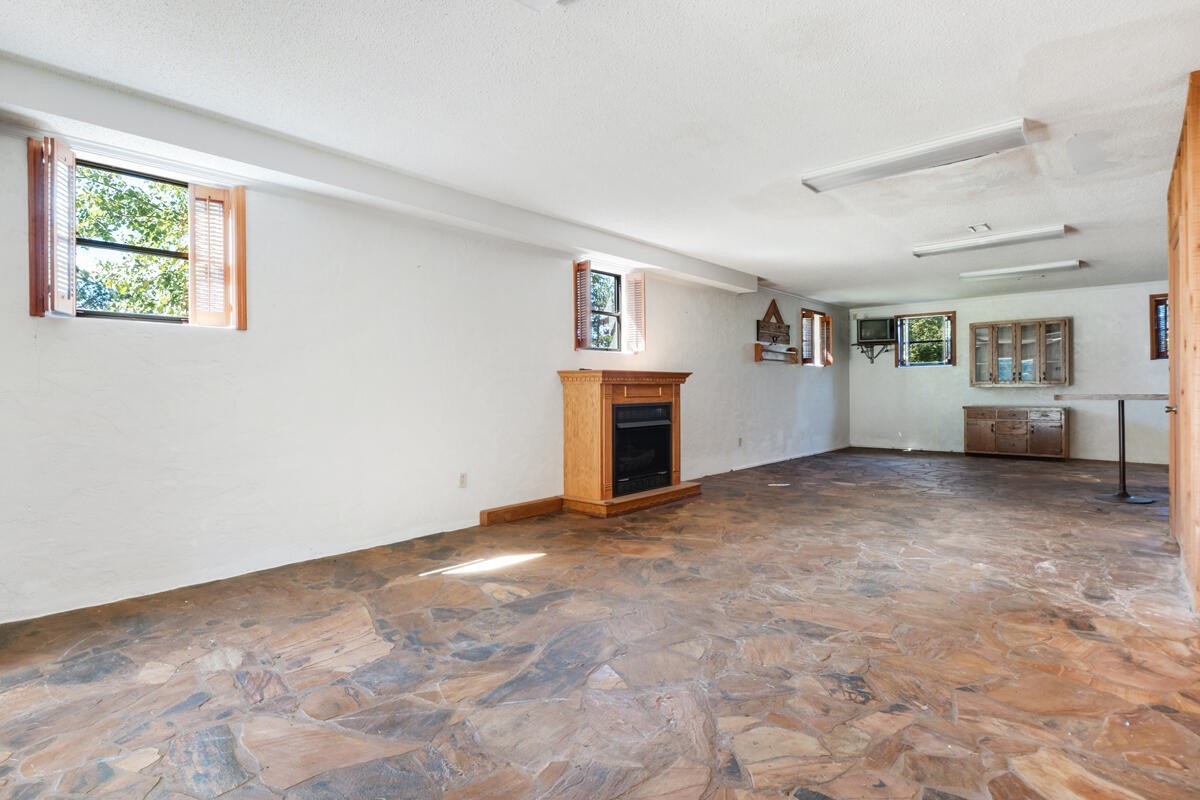 1471 New Hope Church Road Tunnel Hill, GA 30755 - Photo 26 of 45 a view of empty room with a ceiling fan
