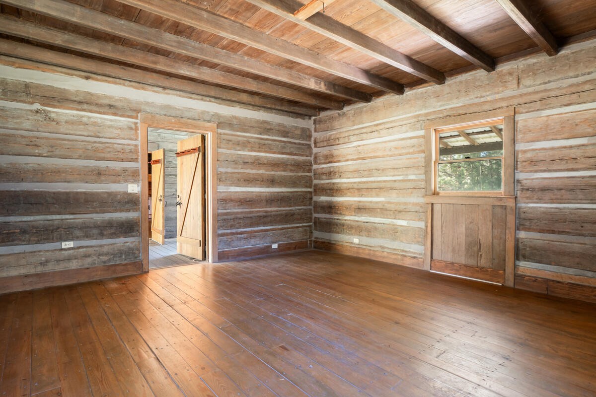 1471 New Hope Church Road Tunnel Hill, GA 30755 - Photo 32 of 45 a view of room with wooden floor and windows