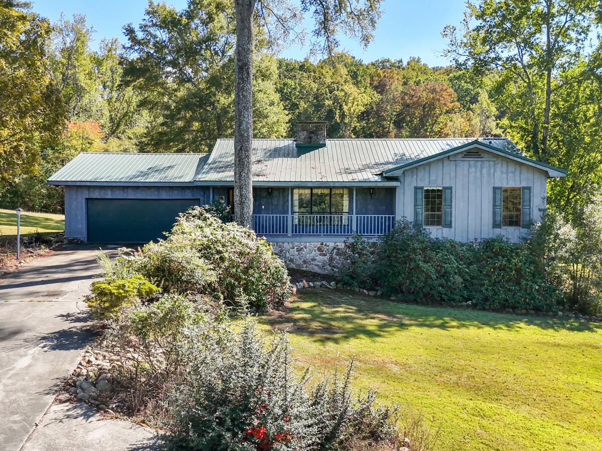 1471 New Hope Church Road Tunnel Hill, GA 30755 - Photo 6 of 45 a front view of a house with a yard