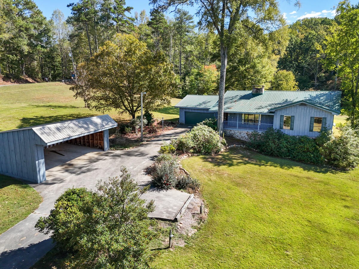 1471 New Hope Church Road Tunnel Hill, GA 30755 - Photo 7 of 45 a view of a house with a yard and sitting area