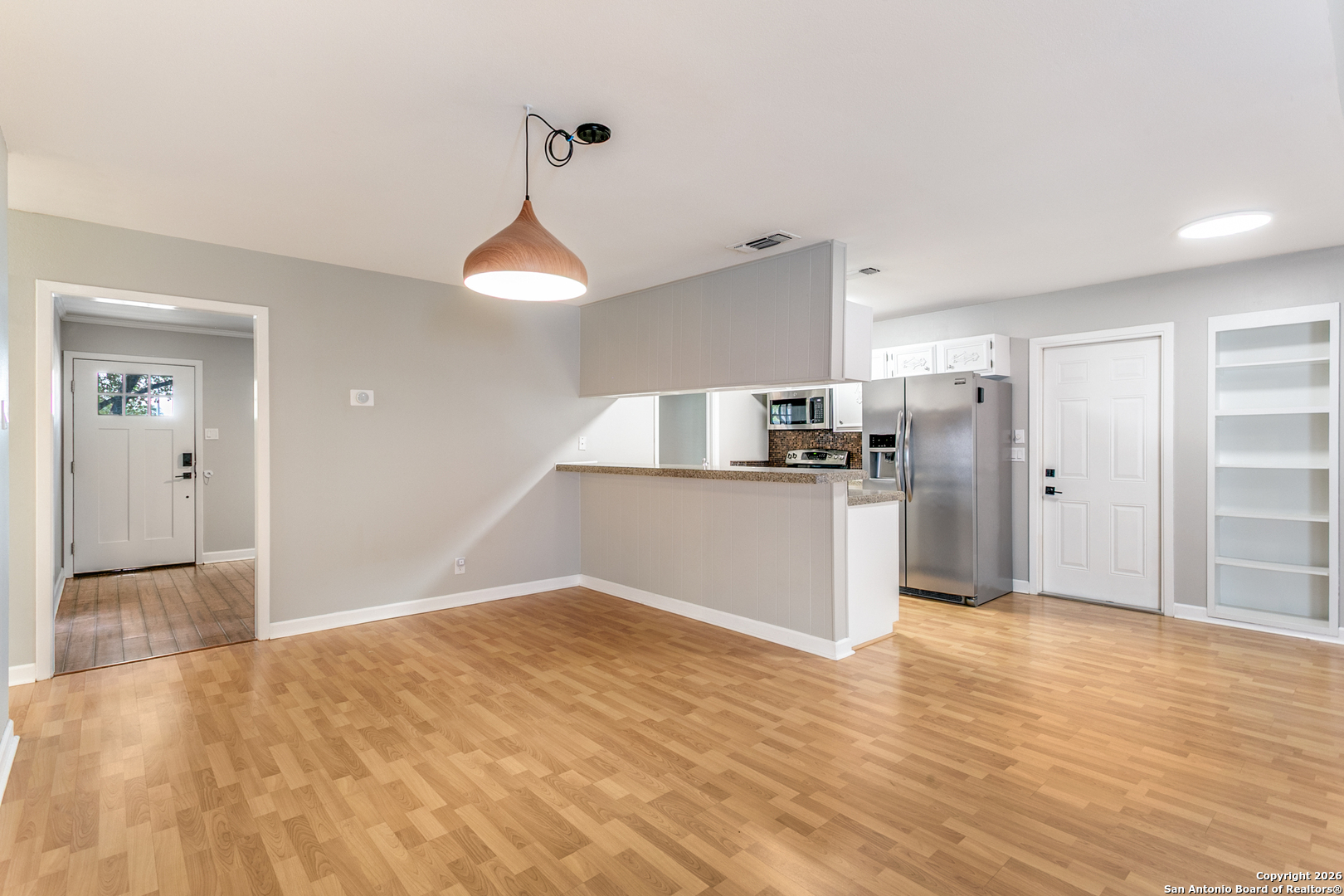 5302 Fair Ridge Drive San Antonio, TX 78228 - Photo 12 of 24 a kitchen with stainless steel appliances a refrigerator and a stove top oven