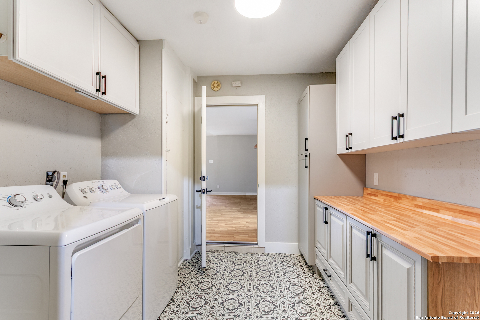 5302 Fair Ridge Drive San Antonio, TX 78228 - Photo 16 of 24 a utility room with dryer and washer