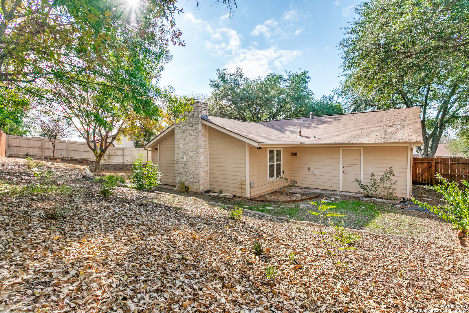 5302 Fair Ridge Drive San Antonio, TX 78228 - Photo 23 of 24 a view of a house with a yard and large tree
