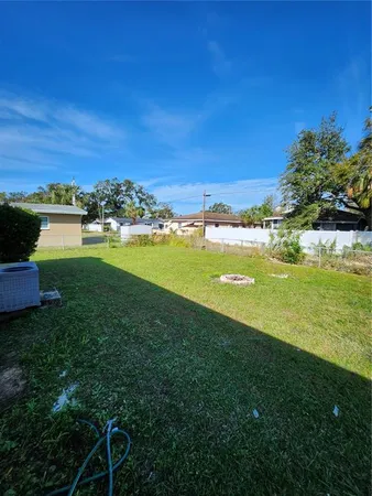 a view of a lake with a big yard