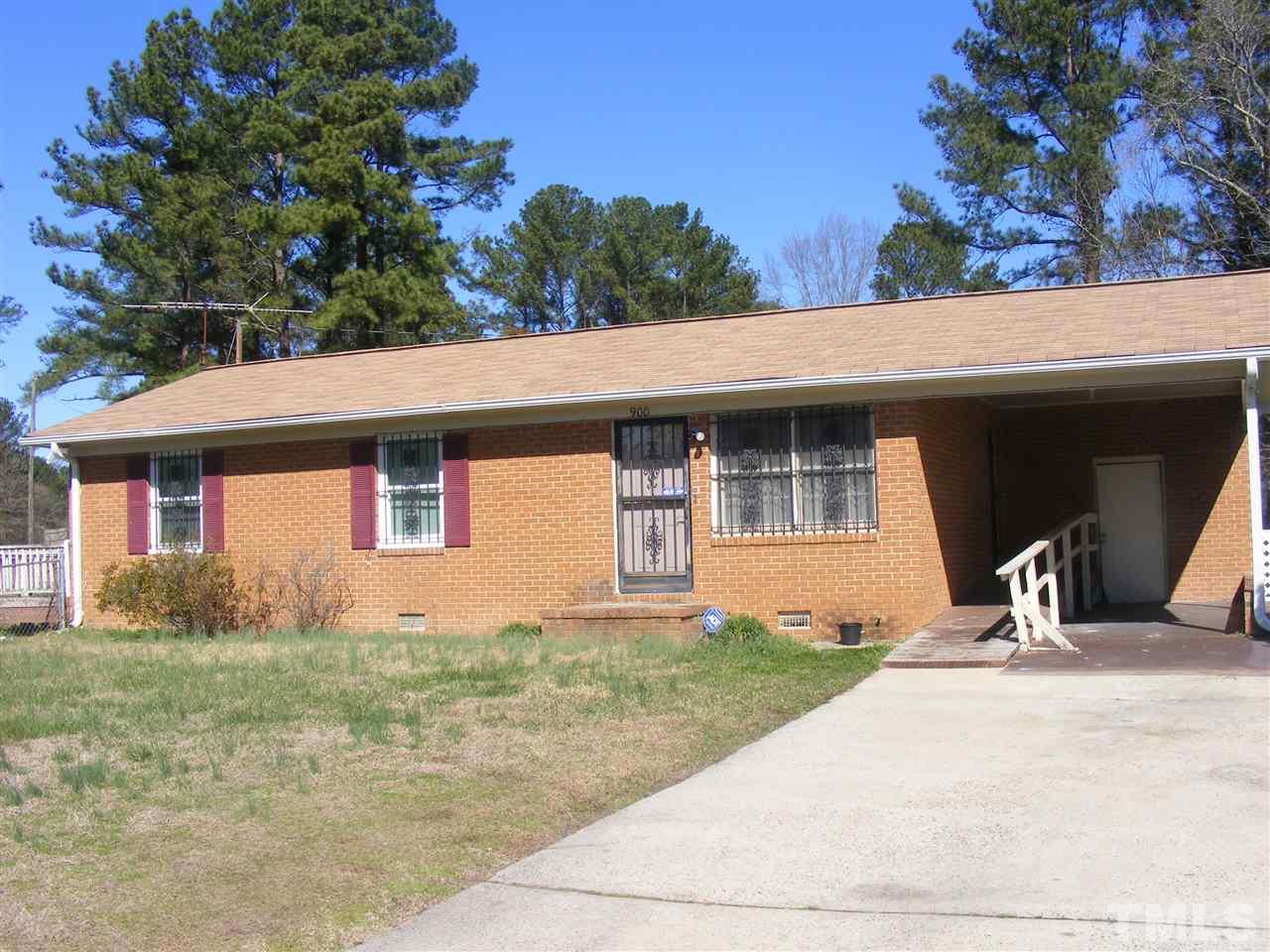 900 Clayton Road Durham, NC 27703 - Photo 1 of 10 a front view of a house with garden