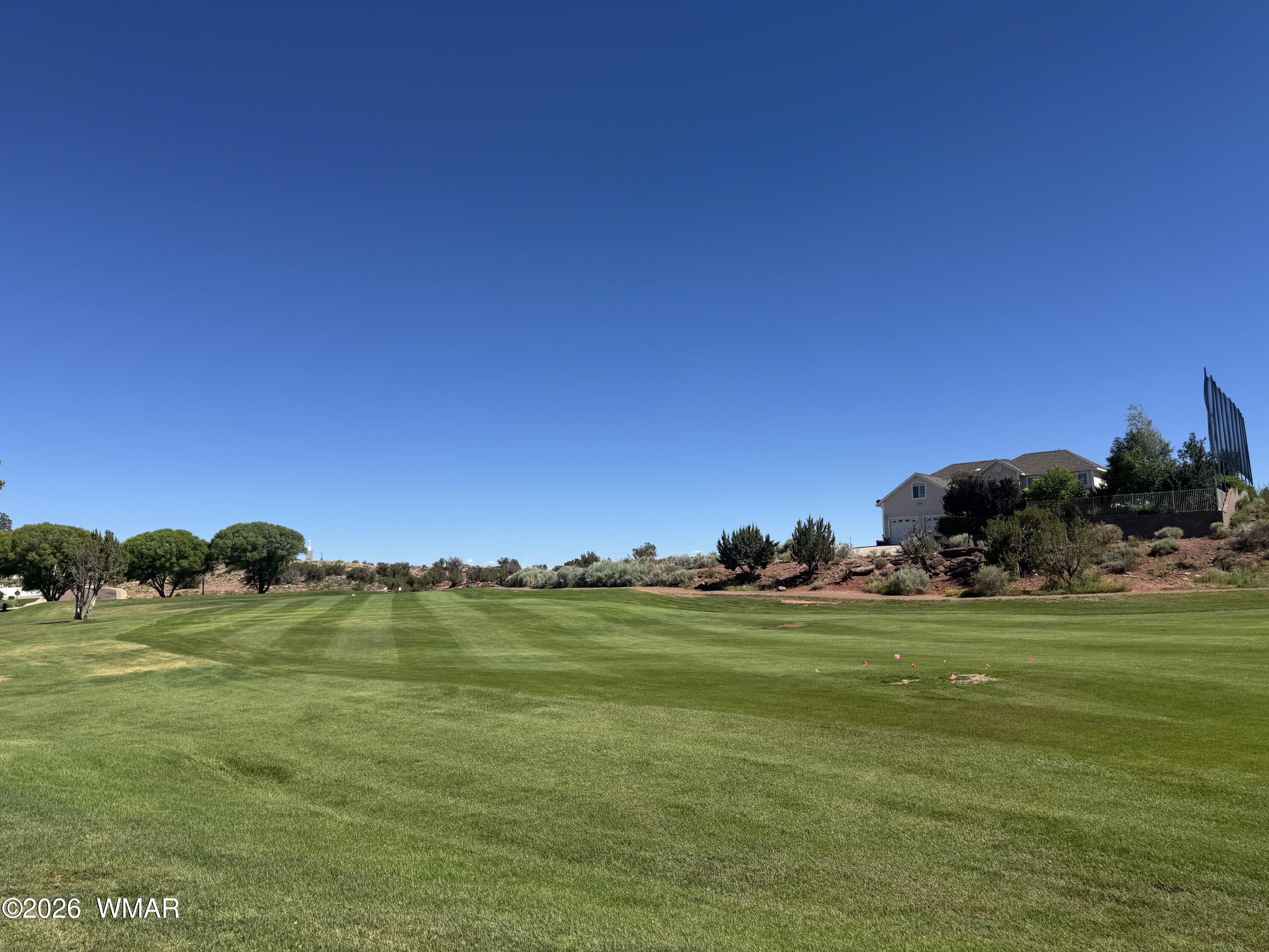 W Sand Trap Lane Snowflake, AZ 85937 - Photo 9 of 11 a view of a grassy field with an trees