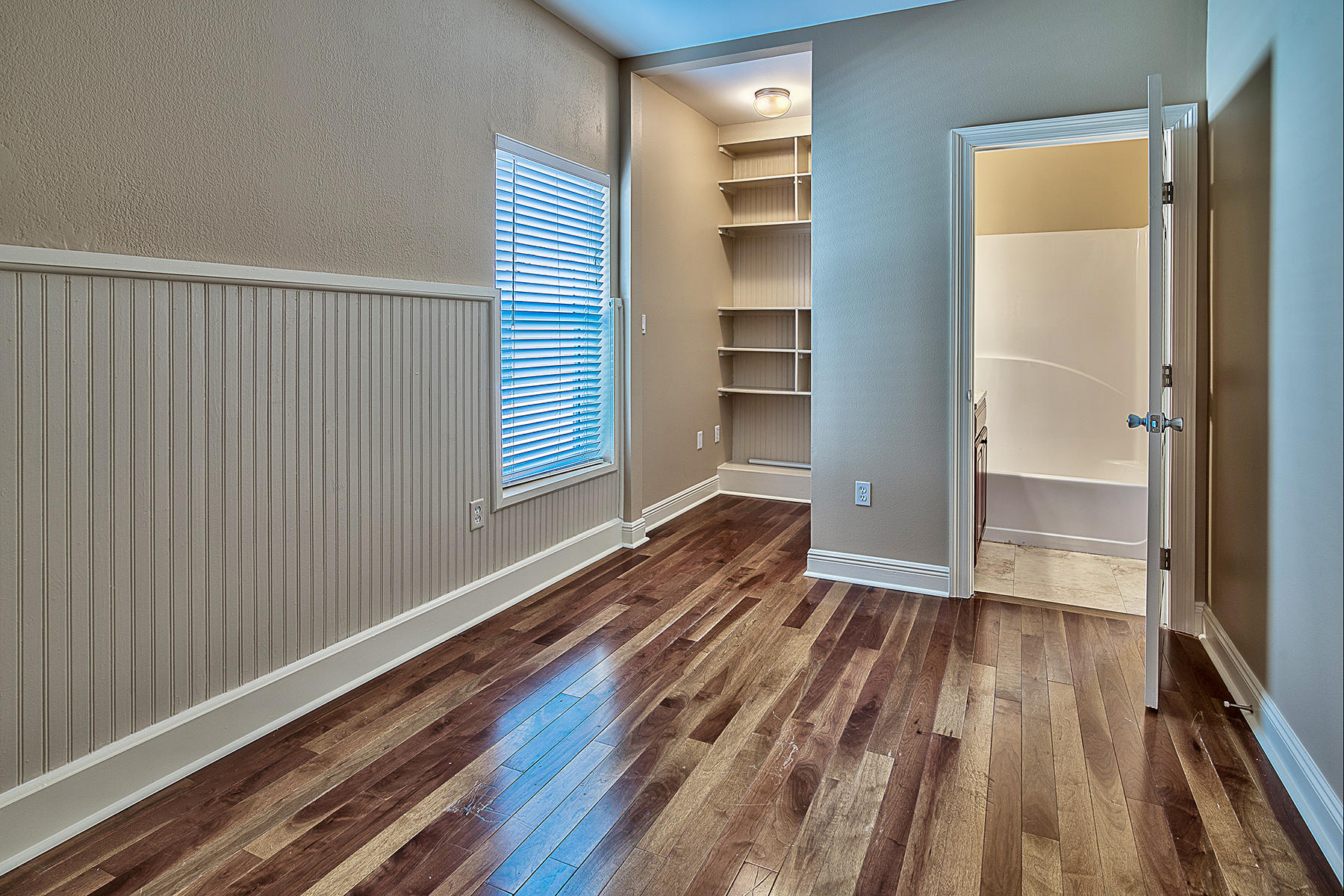 239 Inverrary Drive Destin, FL 32541 - Photo 8 of 20 a view of wooden floor in an empty room