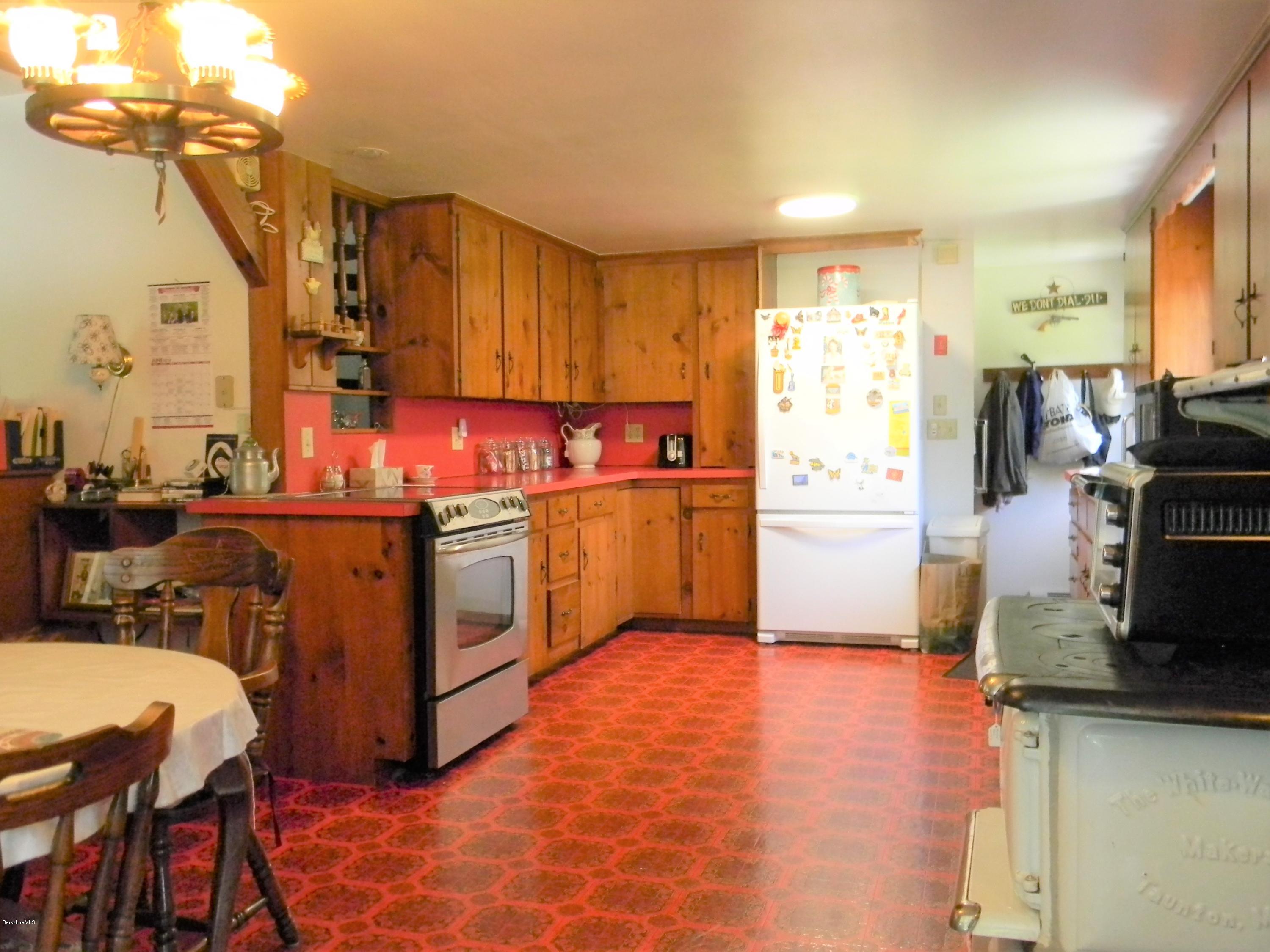 995 Dublin Road Richmond, MA 01254 - Photo 3 of 13 a kitchen with a sink appliances and cabinets
