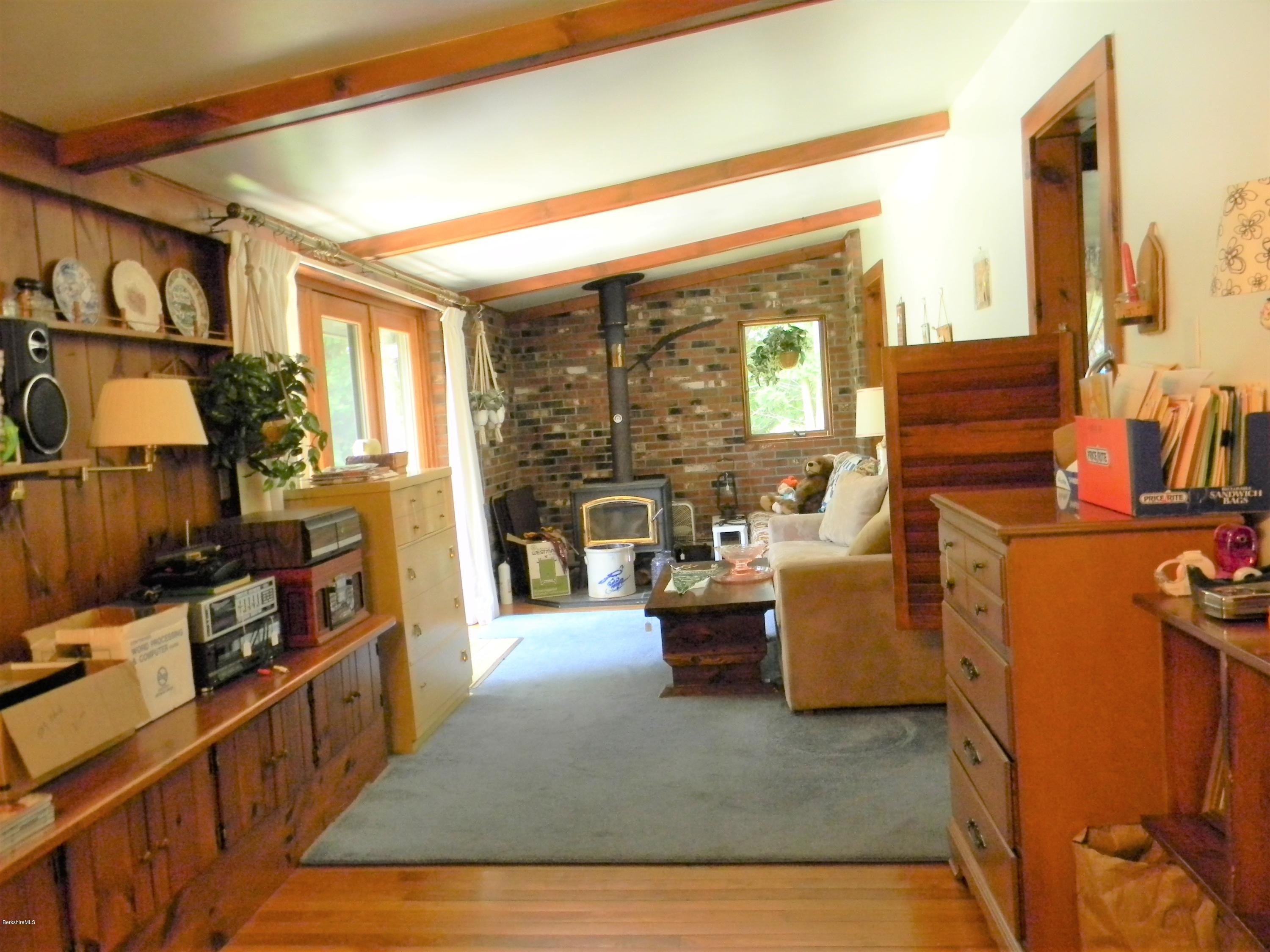 995 Dublin Road Richmond, MA 01254 - Photo 5 of 13 a living room with furniture and a flat screen tv