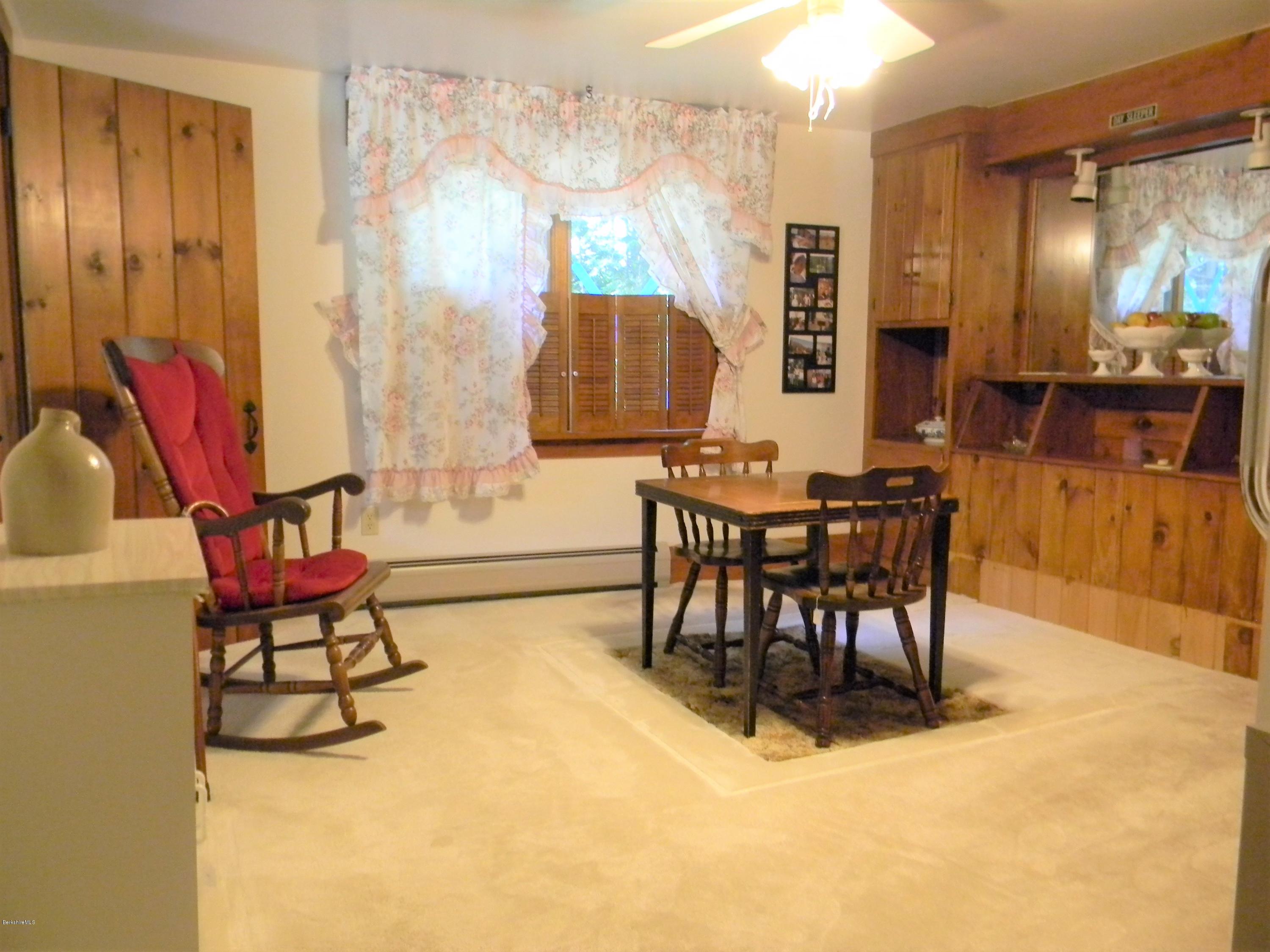 995 Dublin Road Richmond, MA 01254 - Photo 7 of 13 a dining room with furniture and wooden floor