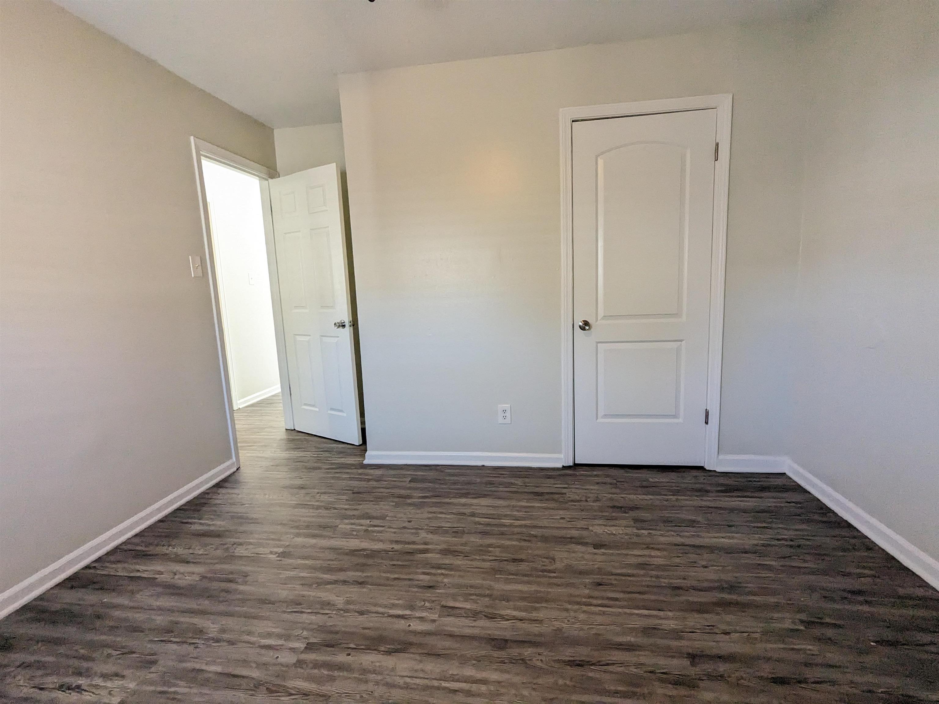 4499 Range Line Road Memphis, TN 38127 - Photo 3 of 10 a view of wooden floor in an empty room