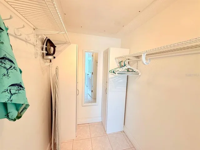 a view of a utility room with closet