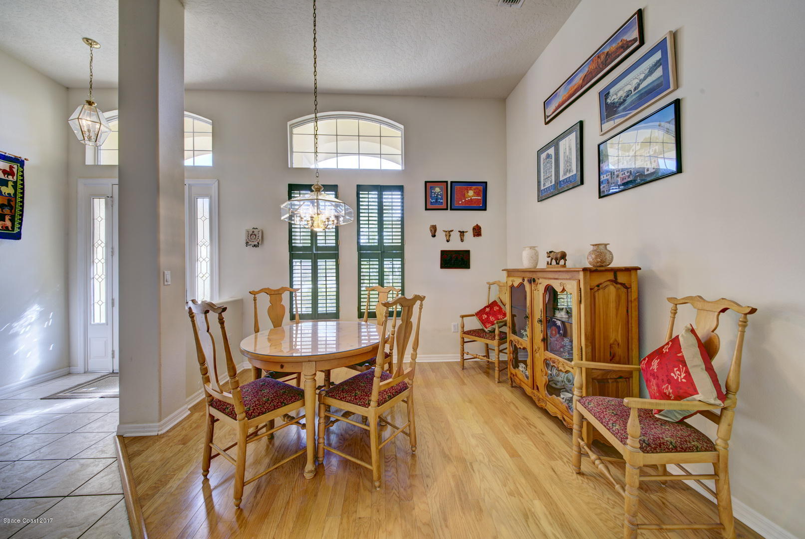 1662 Long Pine Road Melbourne, FL 32940 - Photo 12 of 52 Dining Room with Hardwood Floor