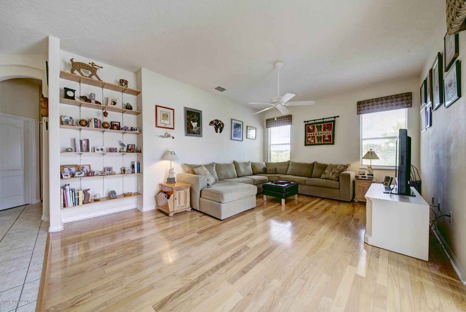 1662 Long Pine Road Melbourne, FL 32940 - Photo 17 of 52 Family Room with Hardwood Floor
