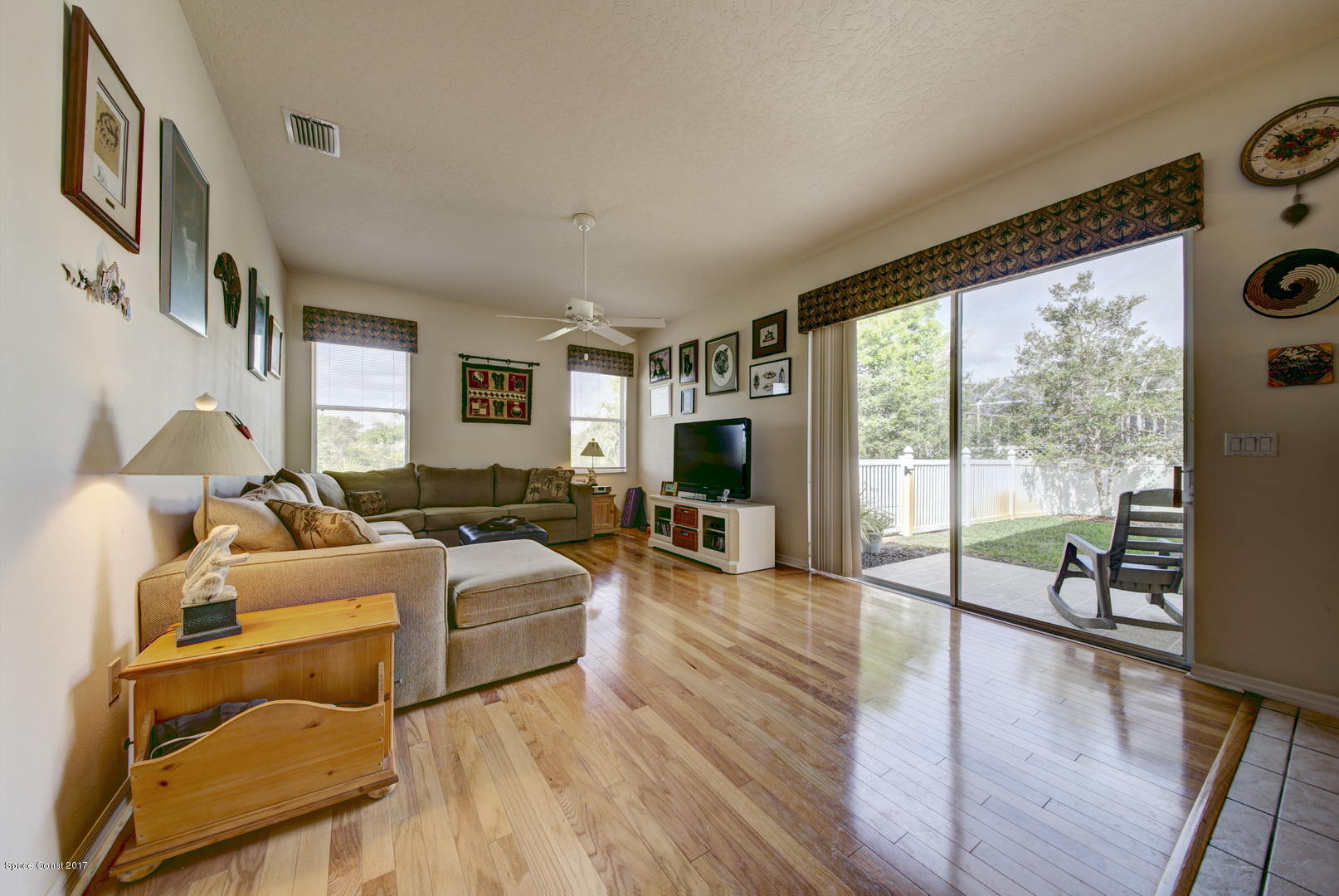 1662 Long Pine Road Melbourne, FL 32940 - Photo 19 of 52 Family Room access to Backyard