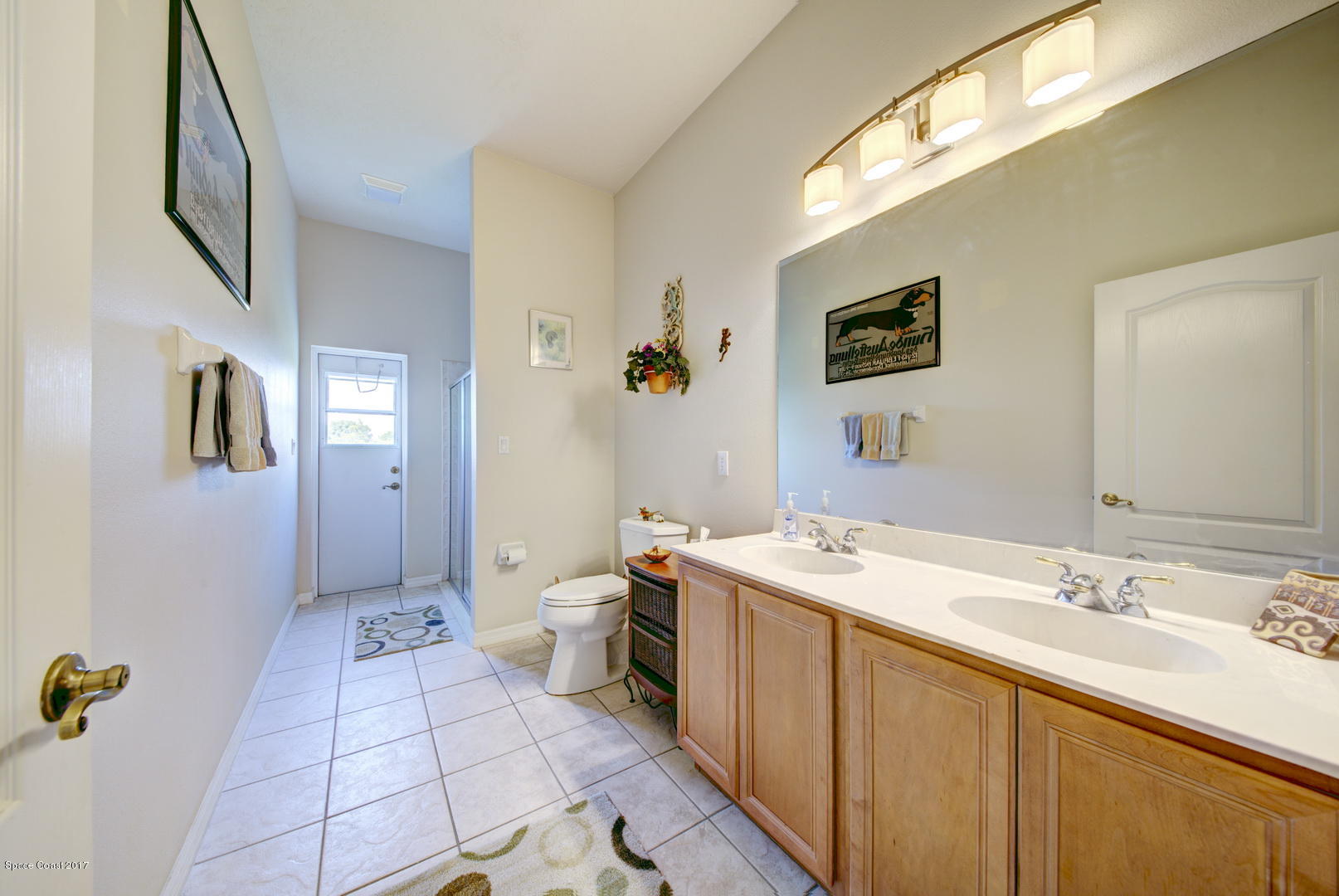 1662 Long Pine Road Melbourne, FL 32940 - Photo 34 of 52 Bathroom 2 access to Backyard