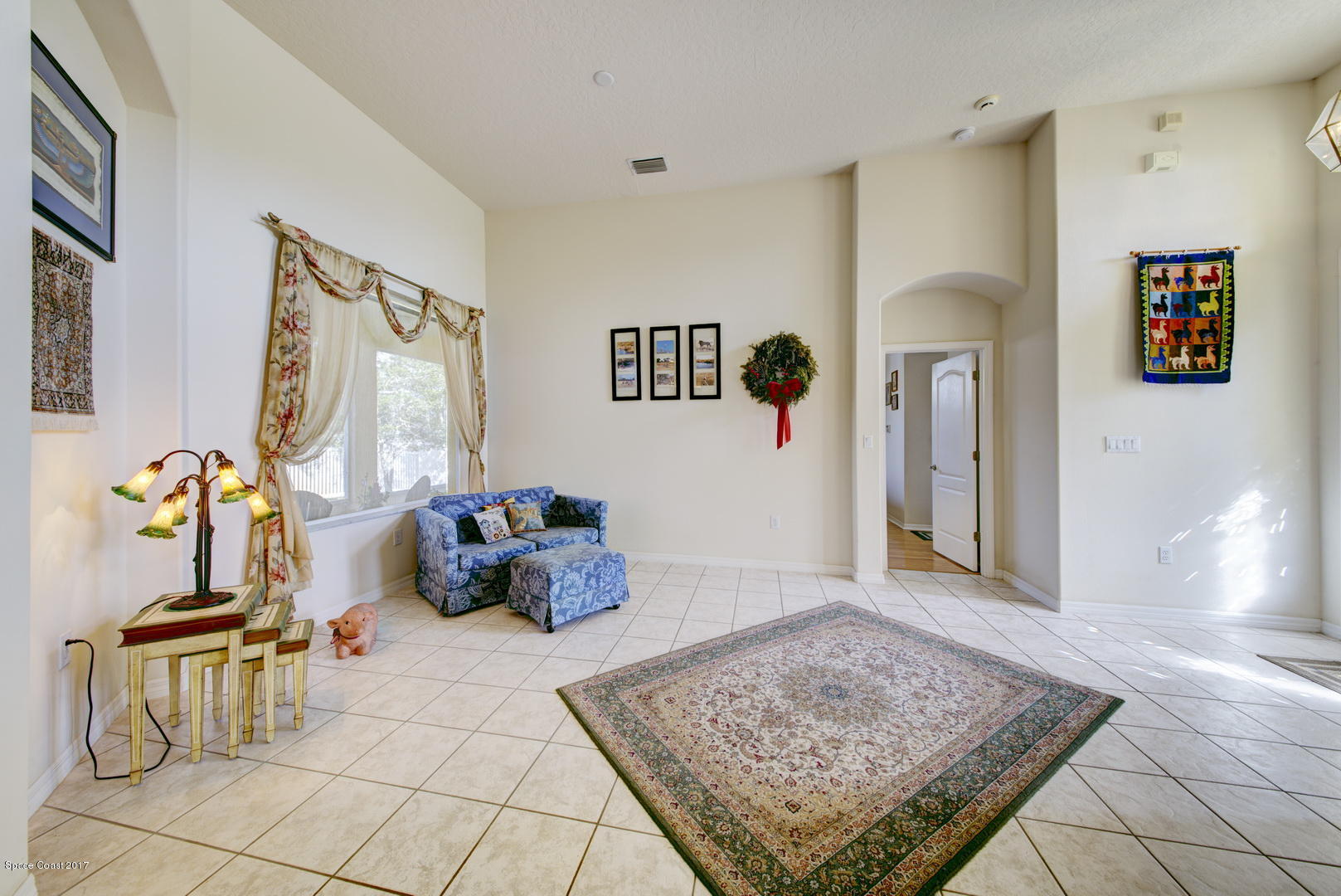 1662 Long Pine Road Melbourne, FL 32940 - Photo 9 of 52 Living Room with Tile Floor