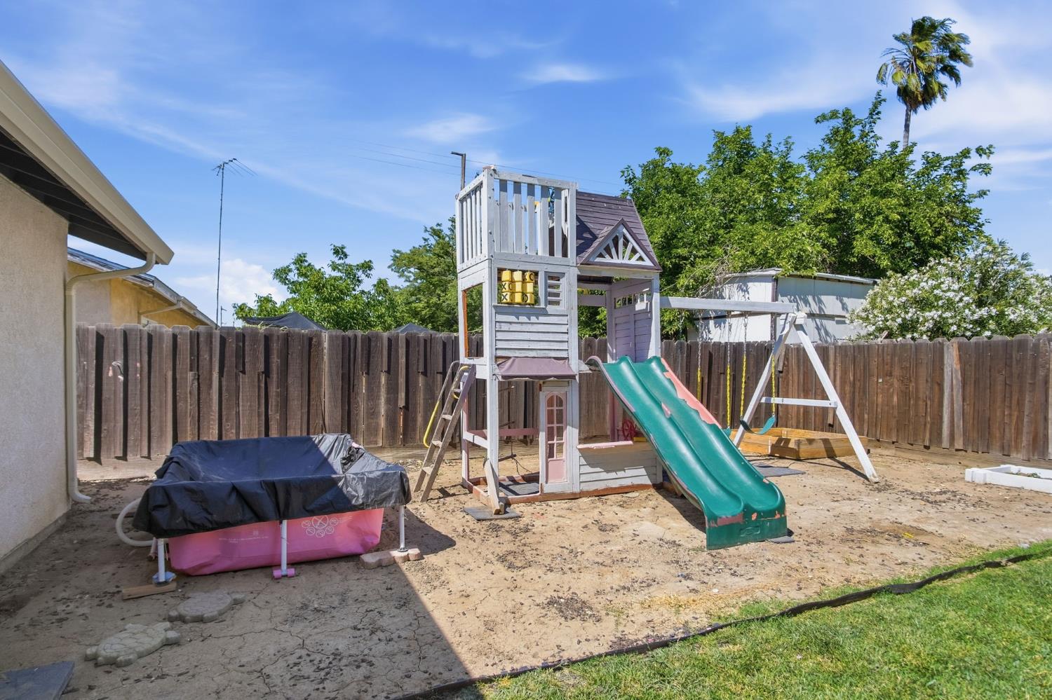 1308 Basil Court Newman, CA 95360 - Photo 20 of 20 a view of a house with a slide