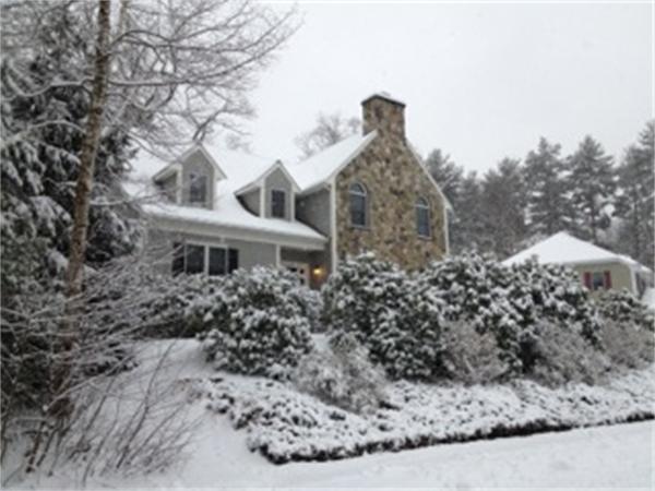 9 Pembroke Road Wellesley, MA 02482 - Photo 1 of 7 a view of a house with a yard and covered with snow