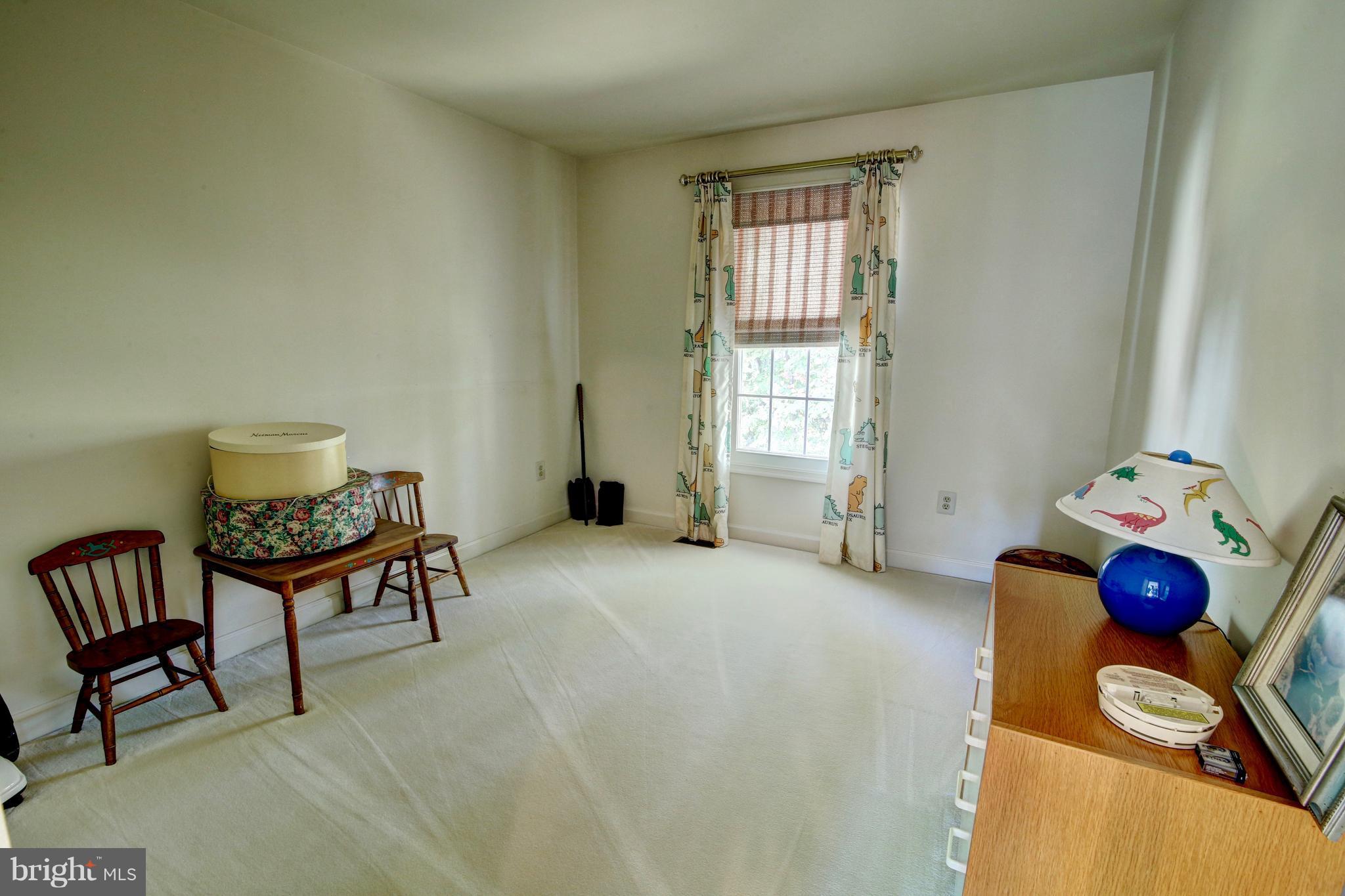 14515 Cutstone Way Silver Spring, MD 20905 - Photo 21 of 29 a living room with furniture and a window