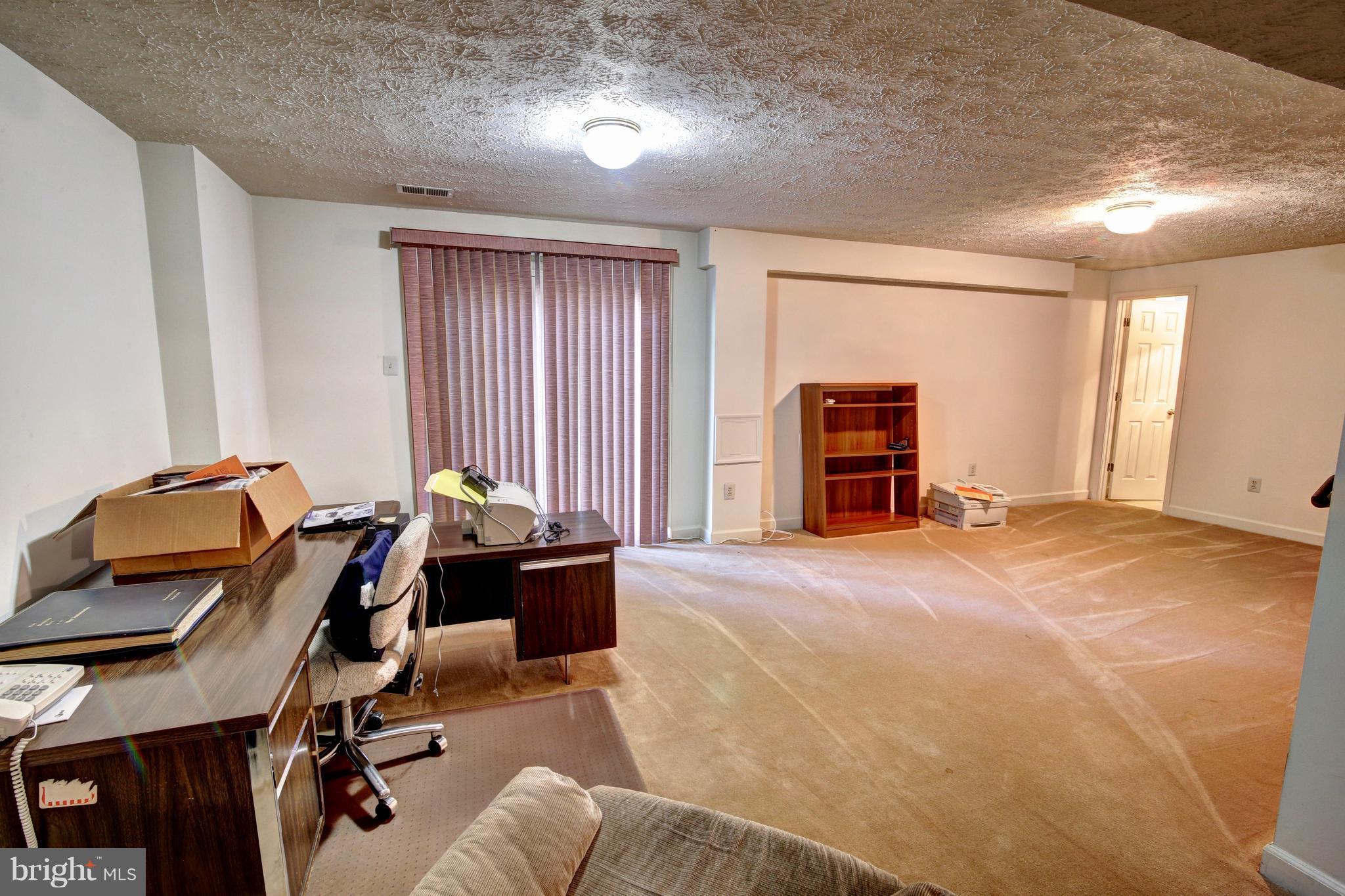 14515 Cutstone Way Silver Spring, MD 20905 - Photo 25 of 29 a workspace with furniture and window