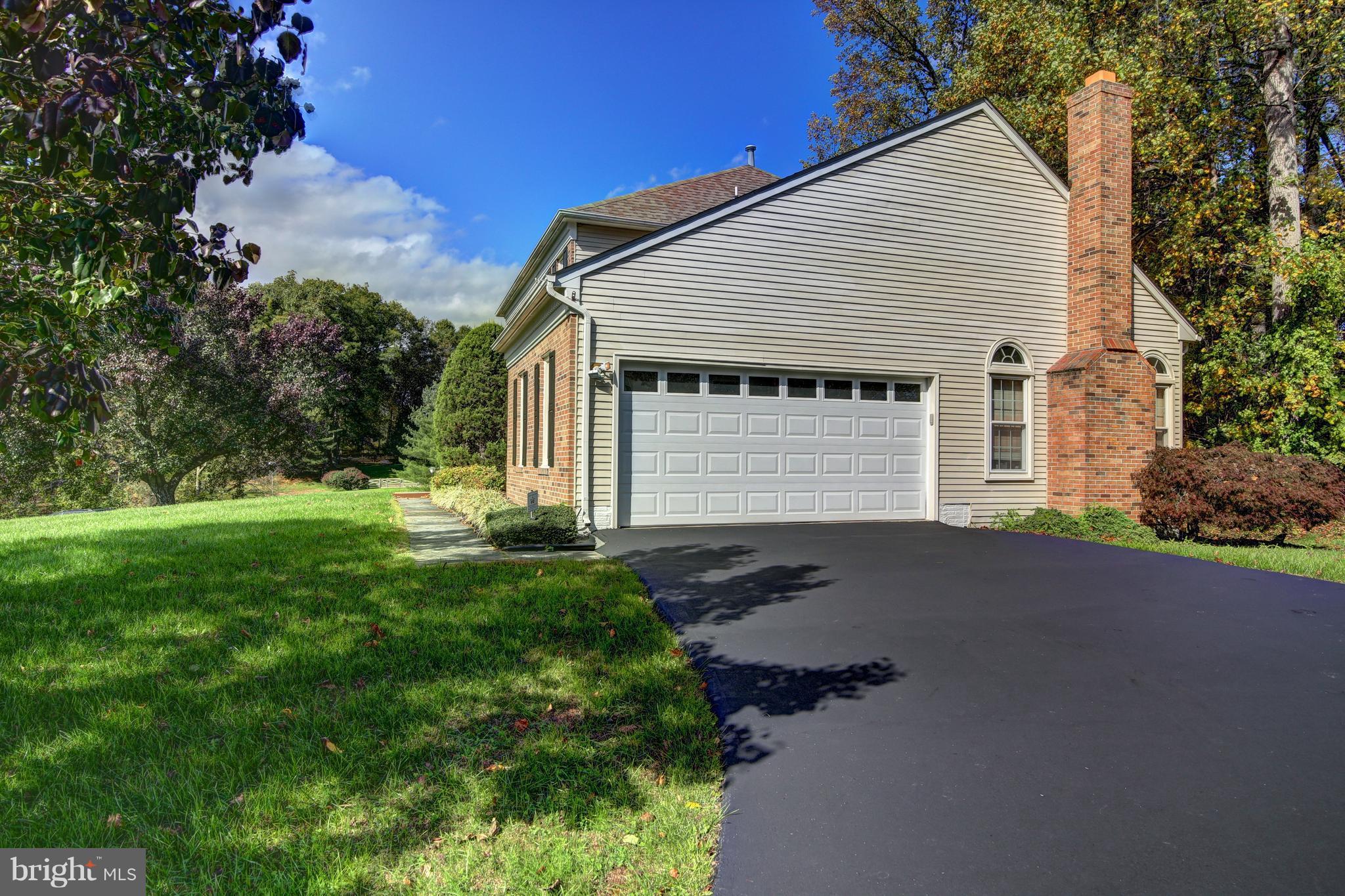 14515 Cutstone Way Silver Spring, MD 20905 - Photo 27 of 29 a view of backyard of house with green space