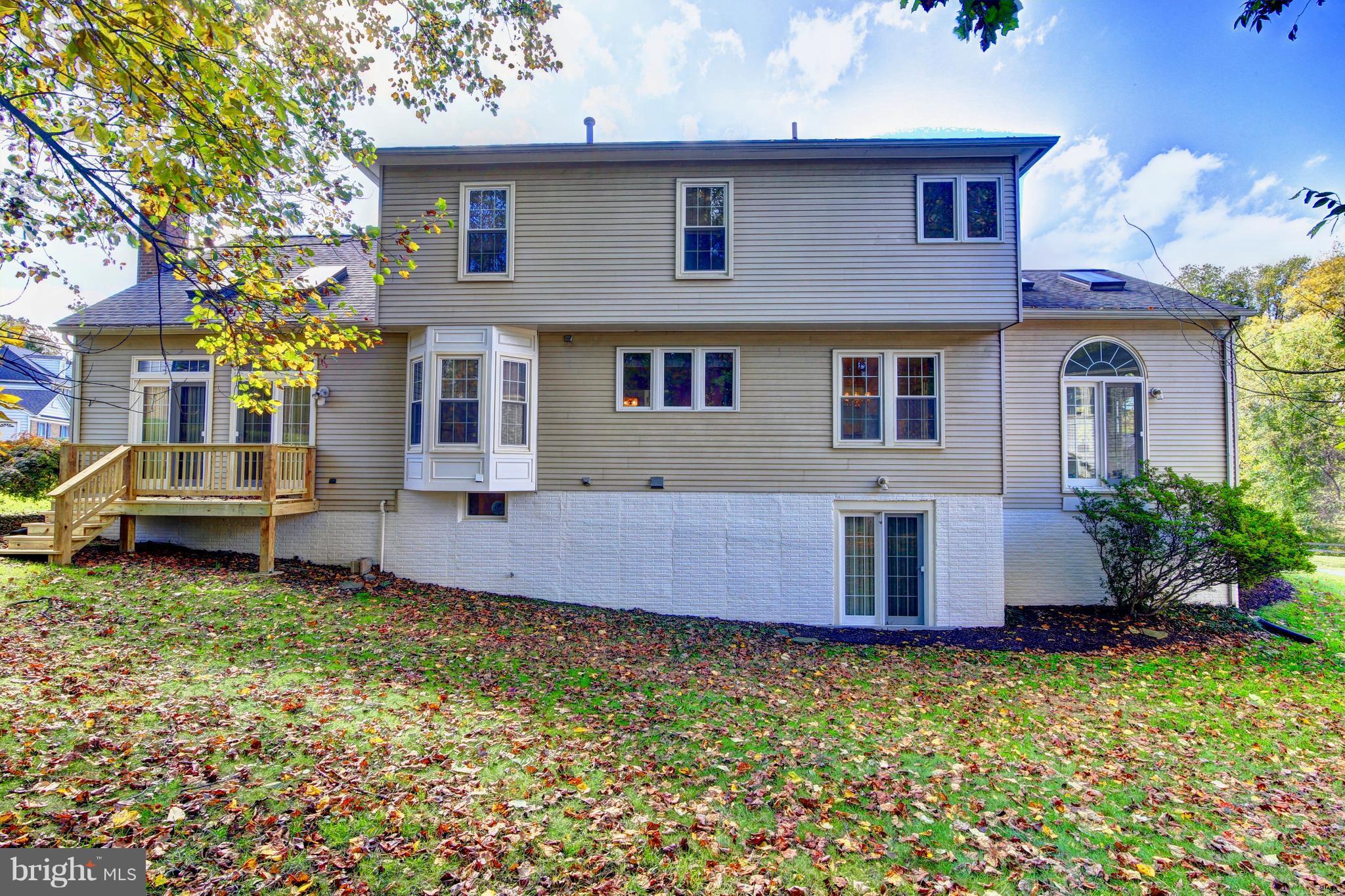 14515 Cutstone Way Silver Spring, MD 20905 - Photo 29 of 29 a front view of house with yard and seating