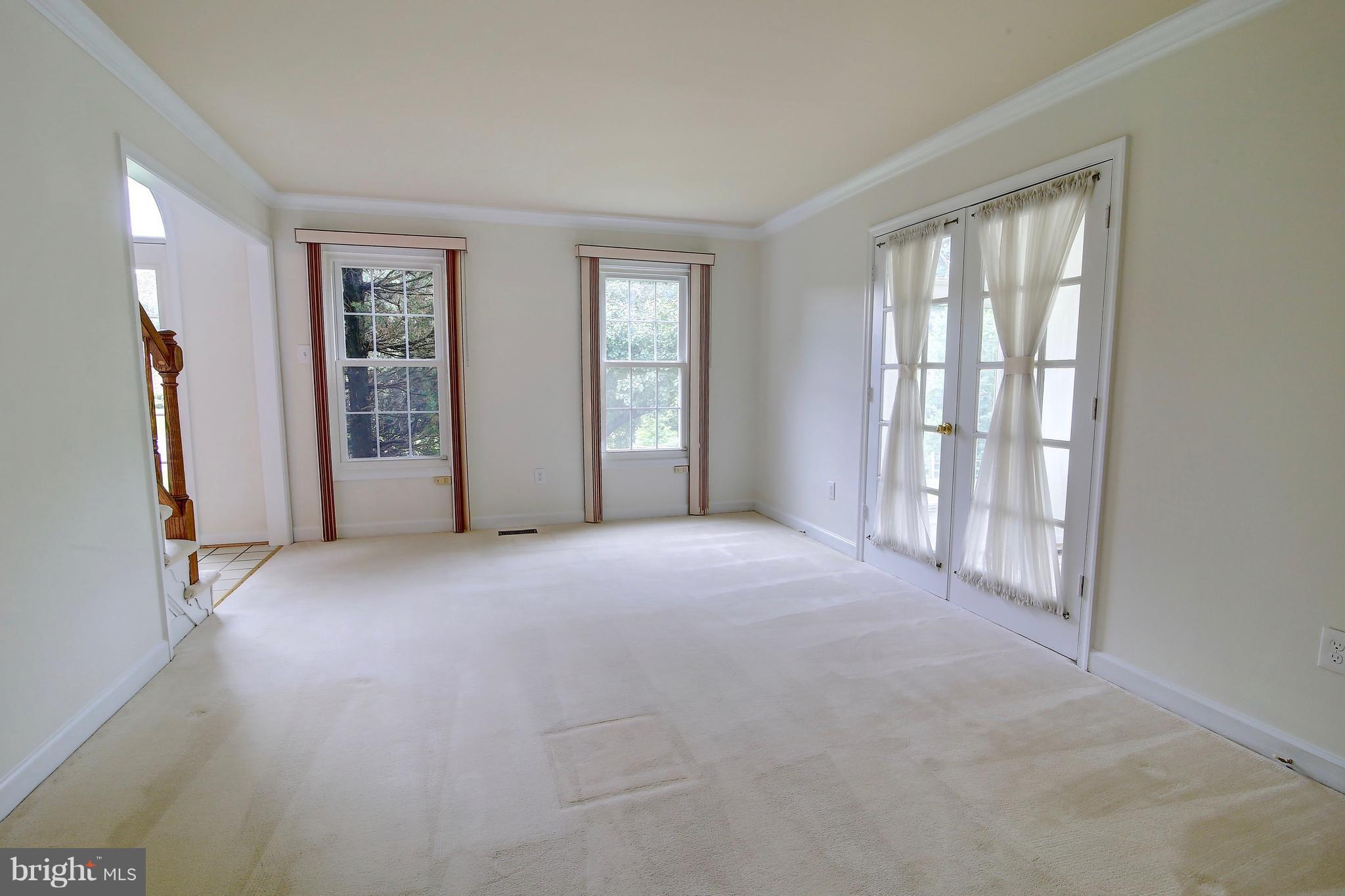 14515 Cutstone Way Silver Spring, MD 20905 - Photo 4 of 29 a view of an empty room with a window