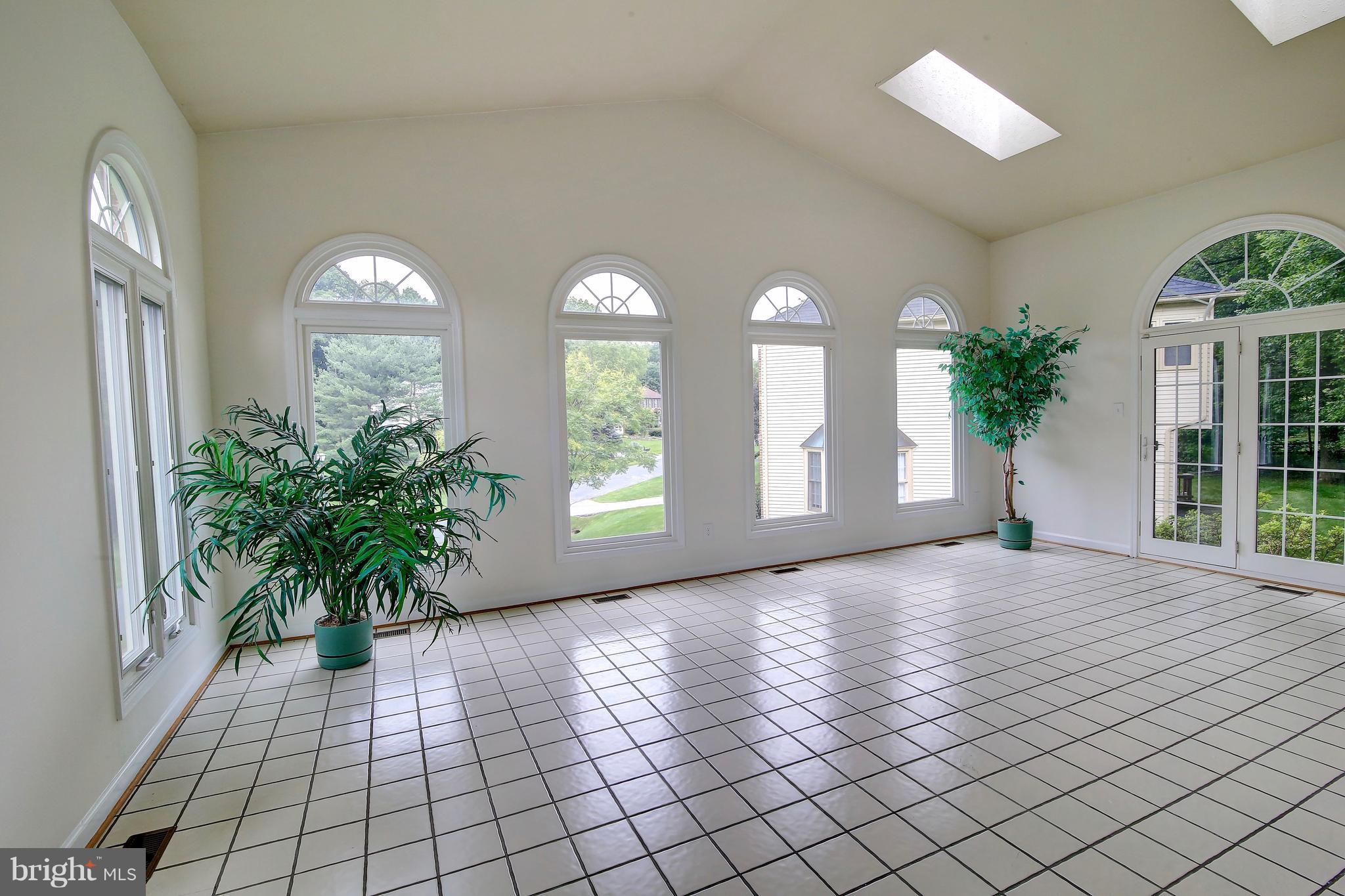 14515 Cutstone Way Silver Spring, MD 20905 - Photo 8 of 29 a view of a garden with windows