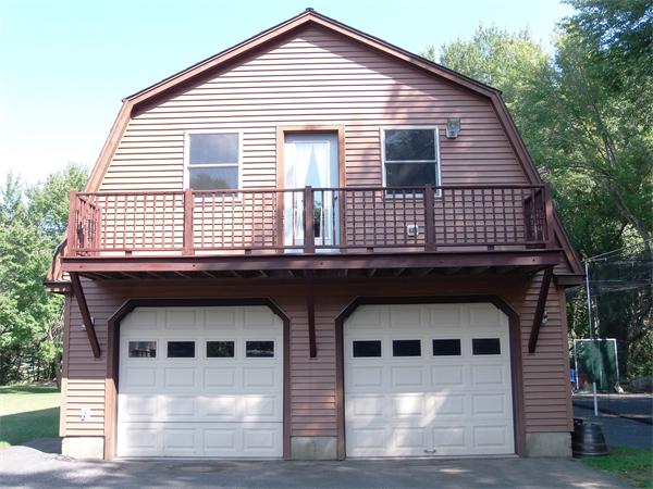 a view of a house with large windows
