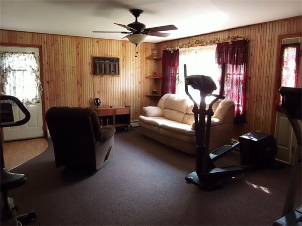 1235 Bemis Road Warren, MA 01083 - Photo 12 of 20 a bedroom with furniture and a window