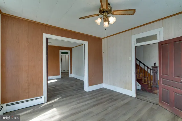 a view of livingroom with hardwood floor and hallway