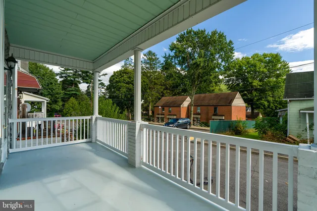 a view of a street from a balcony