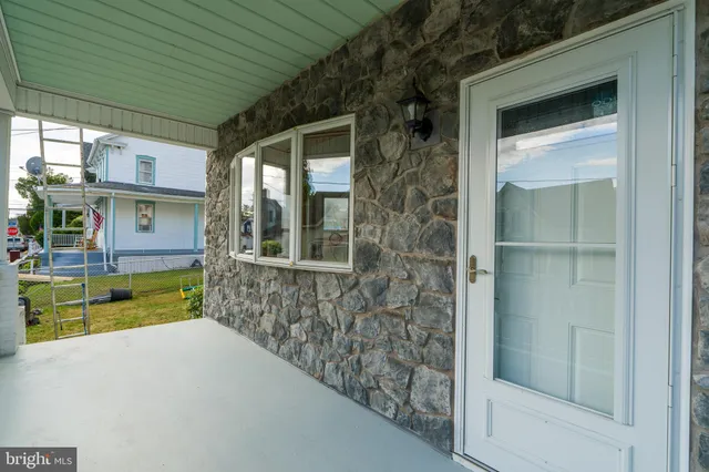 a bathroom with a tub and shower