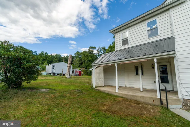 a house view with a garden space