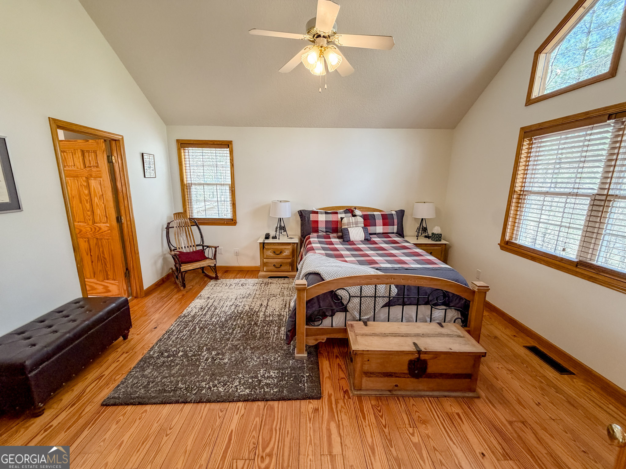 703 Zeppelin Strasse Helen, GA 30545 - Photo 14 of 28 a bedroom with a bed and wooden floor