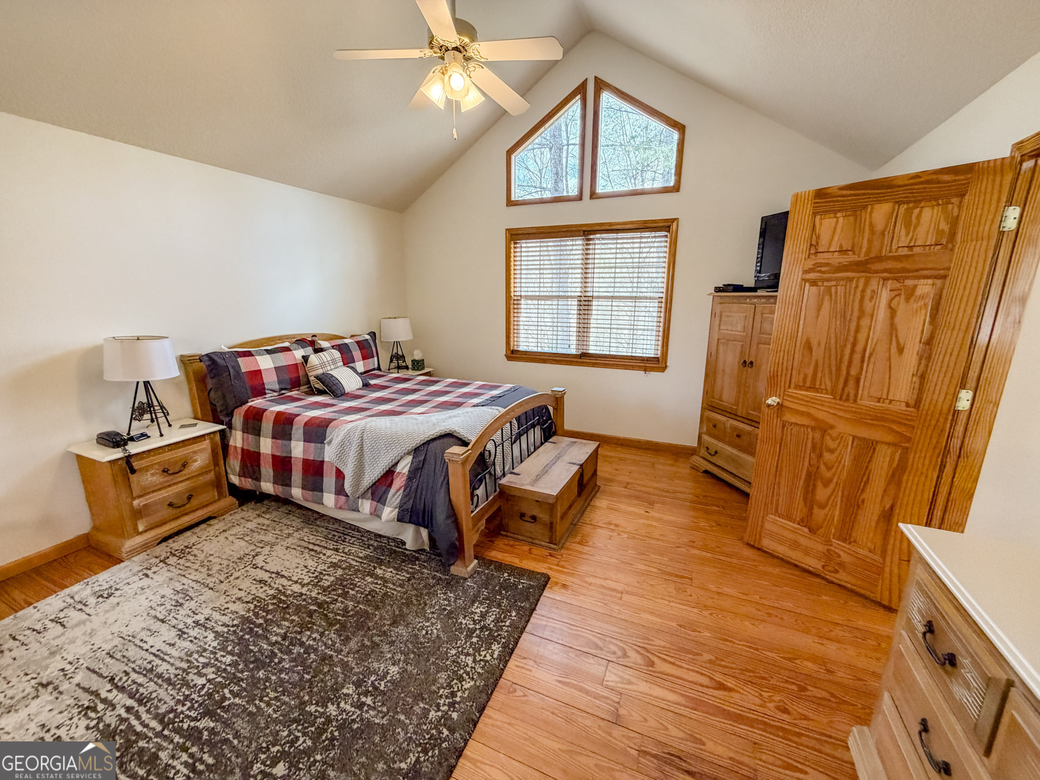 703 Zeppelin Strasse Helen, GA 30545 - Photo 15 of 28 a bed room with a bed and a window