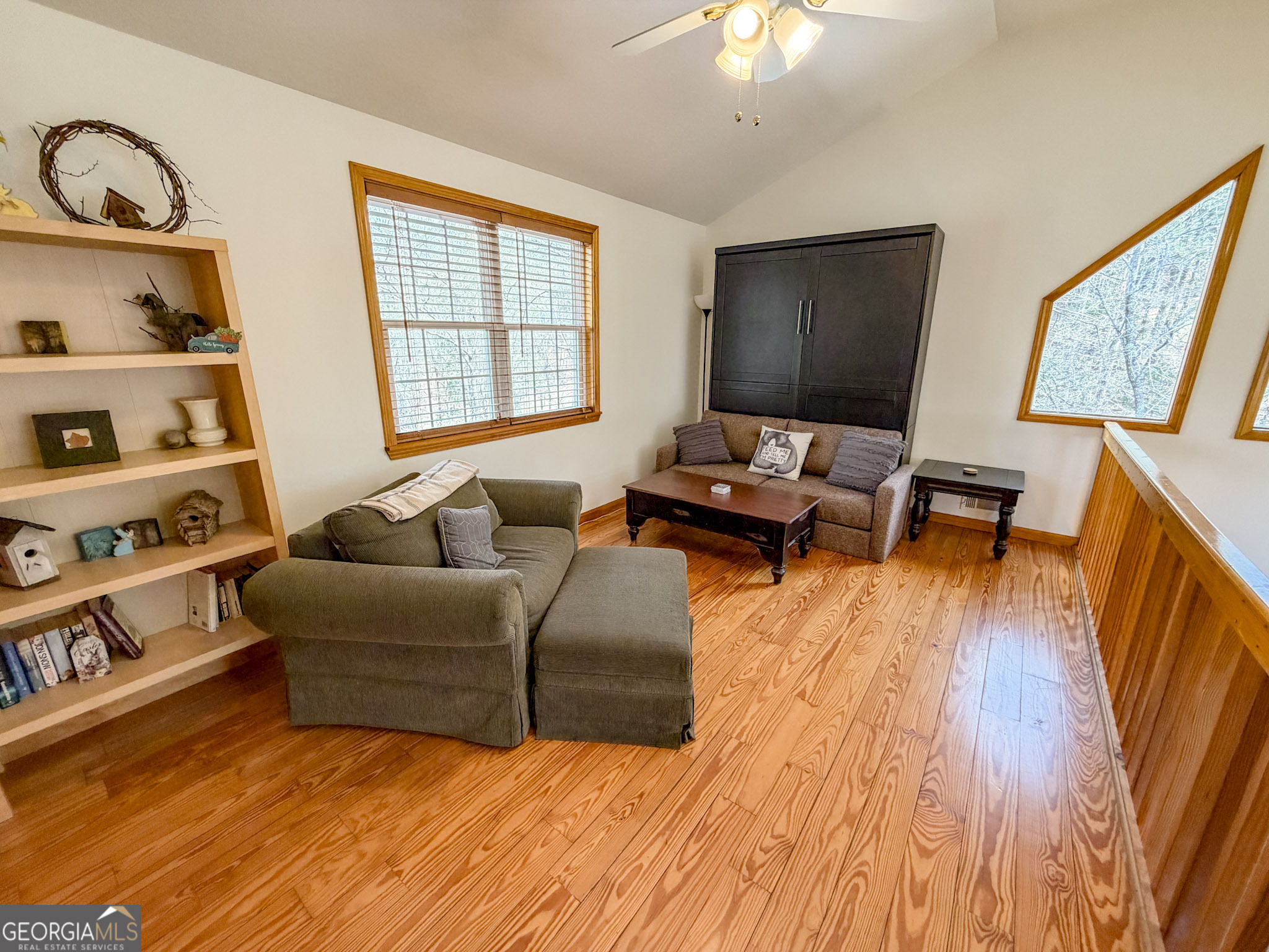 703 Zeppelin Strasse Helen, GA 30545 - Photo 19 of 28 a living room with furniture and a flat screen tv
